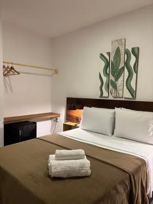 Uma cama ou camas num quarto em Quarto pra Casal, no centro de Jericoacoara!