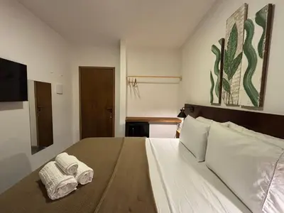 Uma cama ou camas num quarto em Quarto pra Casal, no centro de Jericoacoara!
