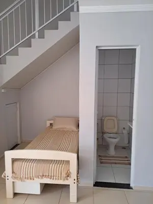 Uma cama ou camas num quarto em Apartamento Dúplex em Flecheiras