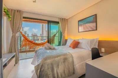 Uma cama ou camas num quarto em Beach Class Meireles Fortaleza by Carpediem