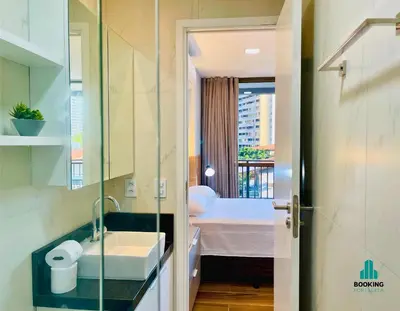 Uma cama ou camas num quarto em J. Smart Guararapes by Holiday Stays