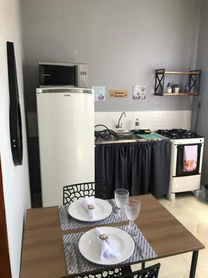 A cozinha ou kitchenette de Chalé Vista ao Mar gray