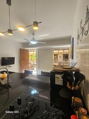 Uma televisão e/ou sistema de entretenimento em Ecoparadise Flat 103