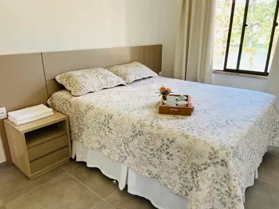 Uma cama ou camas num quarto em Montserrat em Guaramiranga, Ap 10