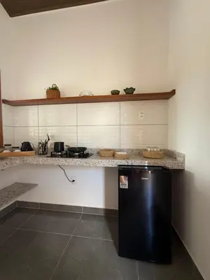 A cozinha ou kitchenette de Pousada Lagoa do Paraíso