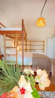 Uma cama ou camas num quarto em Che Brazil Pousada
