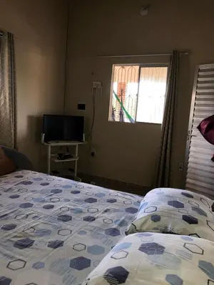 Uma cama ou camas num quarto em Refúgio do Mar