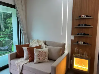 Uma área de estar em apartamentos vila neuve