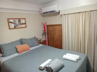 Uma cama ou camas num quarto em Ed Scala Residenza na Beira-mar em Fortaleza