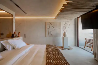 Uma cama ou camas num quarto em Mana Cumbuco Hotel