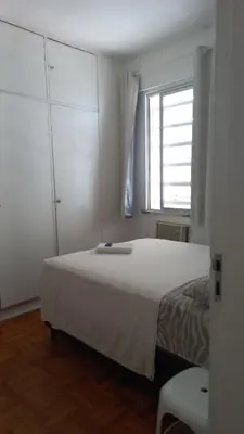 Uma cama ou camas num quarto em Quartos em Meireles Fortaleza