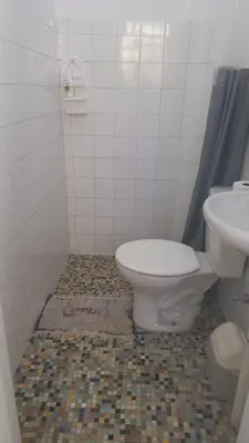 Uma casa de banho em Quartos em Meireles Fortaleza