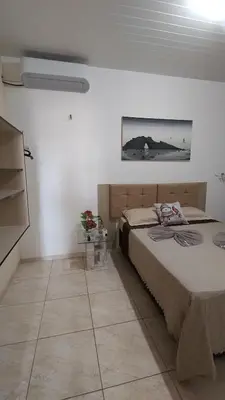 Uma cama ou camas num quarto em Casa ah temporal