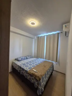 Uma cama ou camas num quarto em Sol & Mar na Praia do Futuro