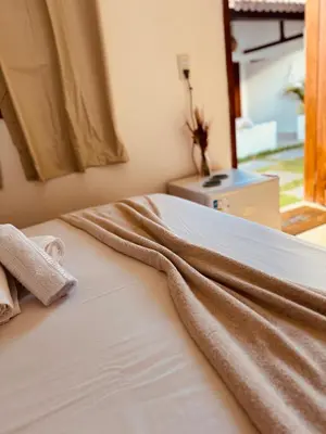 Uma cama ou camas num quarto em Lu Pousada Charme Preá