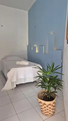 Uma cama ou camas num quarto em La Famiile