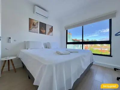Uma cama ou camas num quarto em Bella Arte 2 Rooftop
