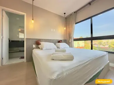 Uma cama ou camas num quarto em Bella Arte 2 Rooftop