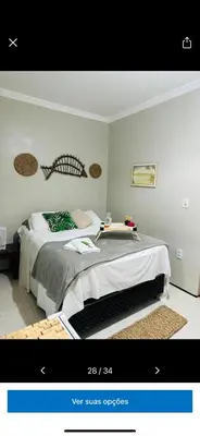 Uma cama ou camas num quarto em Pousada Delicias da vila