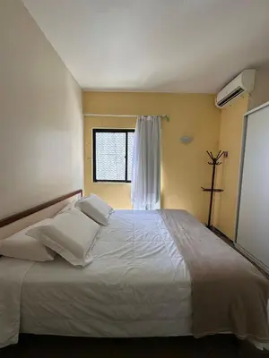 Uma cama ou camas num quarto em Av. Beira Mar - Flat com Localização Perfeita