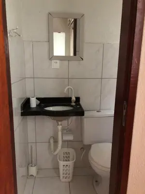 Uma casa de banho em Apartamentos Green