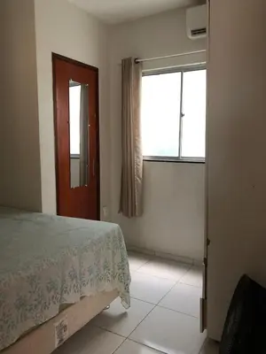 Uma cama ou camas num quarto em Apartamentos Green