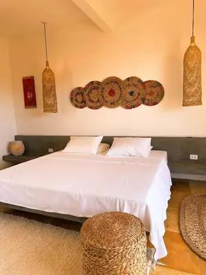 Uma cama ou camas num quarto em Casa Tartaruga Emboaca Trairí