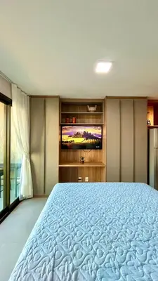 Uma cama ou camas num quarto em Acorde com o Sol de Fortaleza Studio Charmoso no Meireles