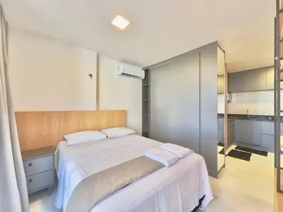 Uma cama ou camas num quarto em JSmart - Carolina Sucupira