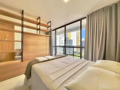 Uma cama ou camas num quarto em JSmart - Carolina Sucupira