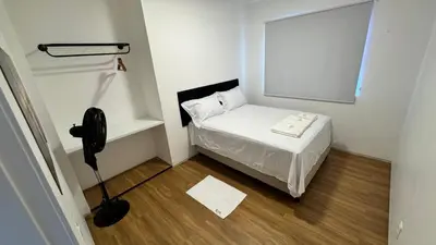 Uma cama ou camas num quarto em Amplo Apartamento com 3 Quartos em Fortaleza