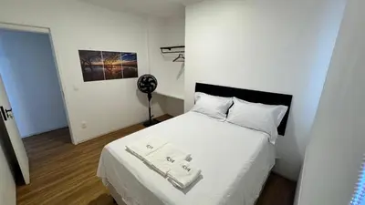 Uma cama ou camas num quarto em Amplo Apartamento com 3 Quartos em Fortaleza