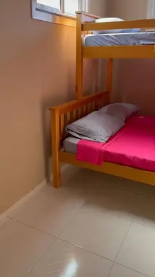 Uma cama ou camas num quarto em Residencial Portela 08C