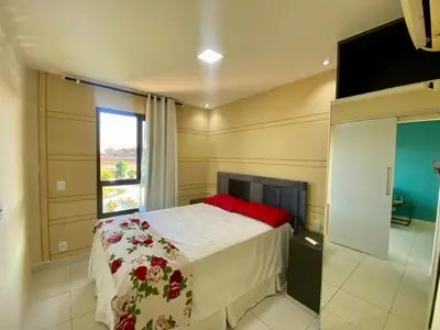 Uma cama ou camas num quarto em Flat da Cacau VG SUN Cumbuco