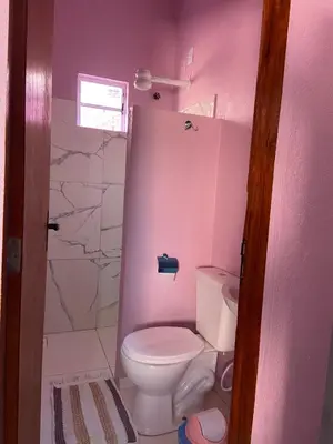 Uma casa de banho em Chale Vista ao Mar Pink