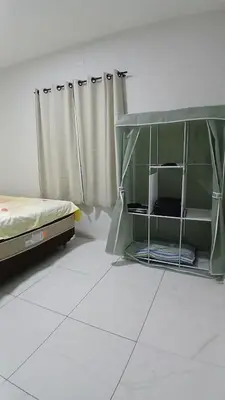 Uma cama ou camas num quarto em Casa Praia Paracuru