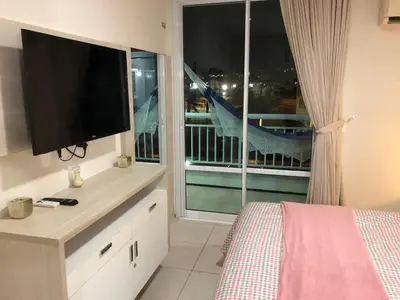 Uma cama ou camas num quarto em Apartamento Pé na Areia Porto das Dunas - Paraiso das Dunas