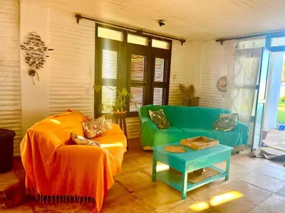 Uma área de estar em POUSADA Coisa Mais Linda e Massagem