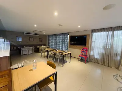 Uma televisão e/ou sistema de entretenimento em Studio Landscape Meireles Fortaleza