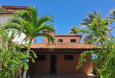 Um jardim no exterior de Casa Mar Poesia - Taiba