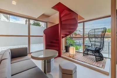 Uma área de estar em JSmart Guararapes #502 - Flat moderno by Carpediem