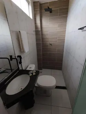 Uma casa de banho em Bendita Parada - Pousada
