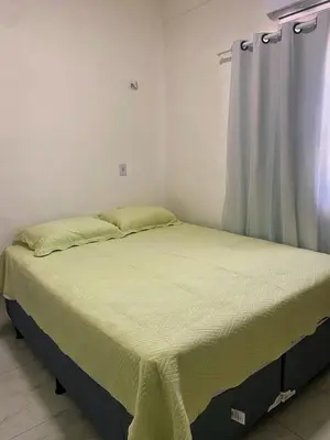 Uma cama ou camas num quarto em Apto compacto para familia 403