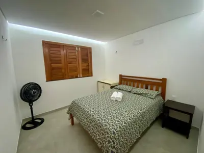 Uma cama ou camas num quarto em Casa Alvorada