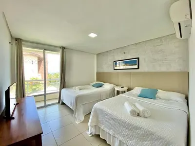 Uma cama ou camas num quarto em Sweet Home at the Beach - Next to Beach Park