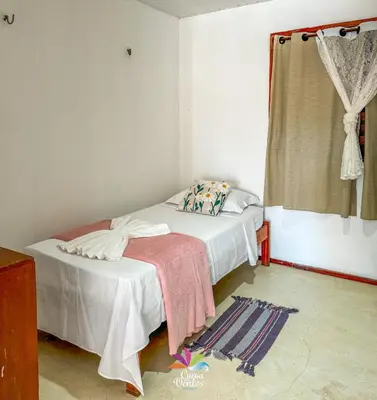 Uma cama ou camas num quarto em Pousada Curva dos Ventos-Próximo à praia com café da manhã em Icaraí de Amontada