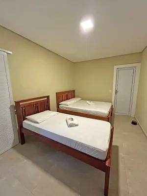 Uma cama ou camas num quarto em Triplex Dunas - Flecheiras
