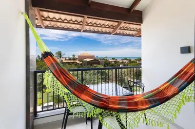 Uma varanda ou terraço em Miami House Cumbuco por Carpediem