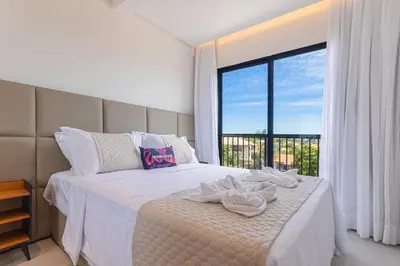 Uma cama ou camas num quarto em Miami House Cumbuco por Carpediem