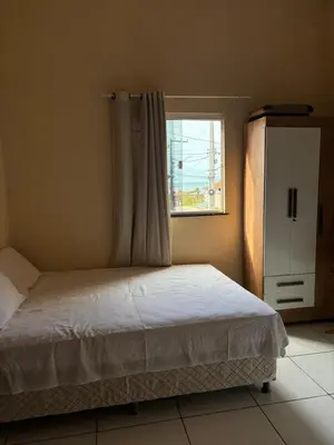 Uma cama ou camas num quarto em Casa jeri de prata